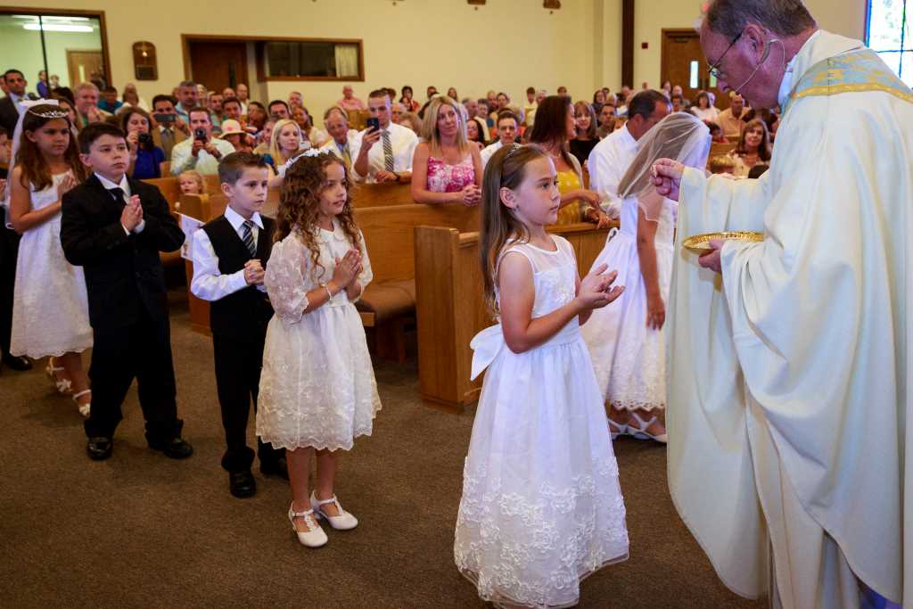 Image of children receiving First Holy Communion